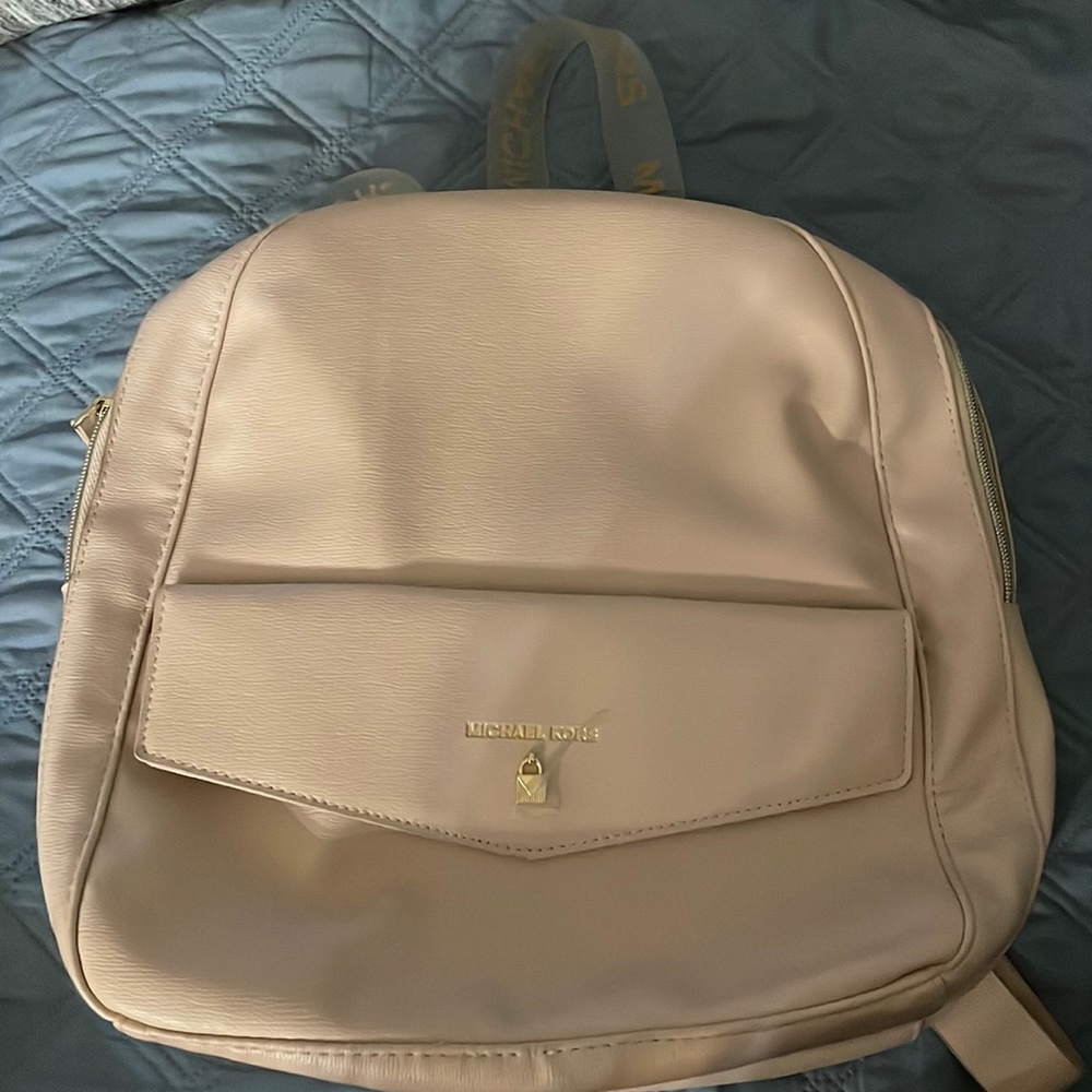 MK light pink backpack